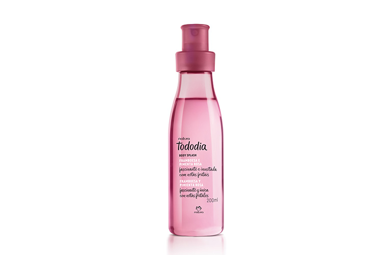 Envase de body splash rosa Tododia con tapa a juego, sobre fondo blanco.